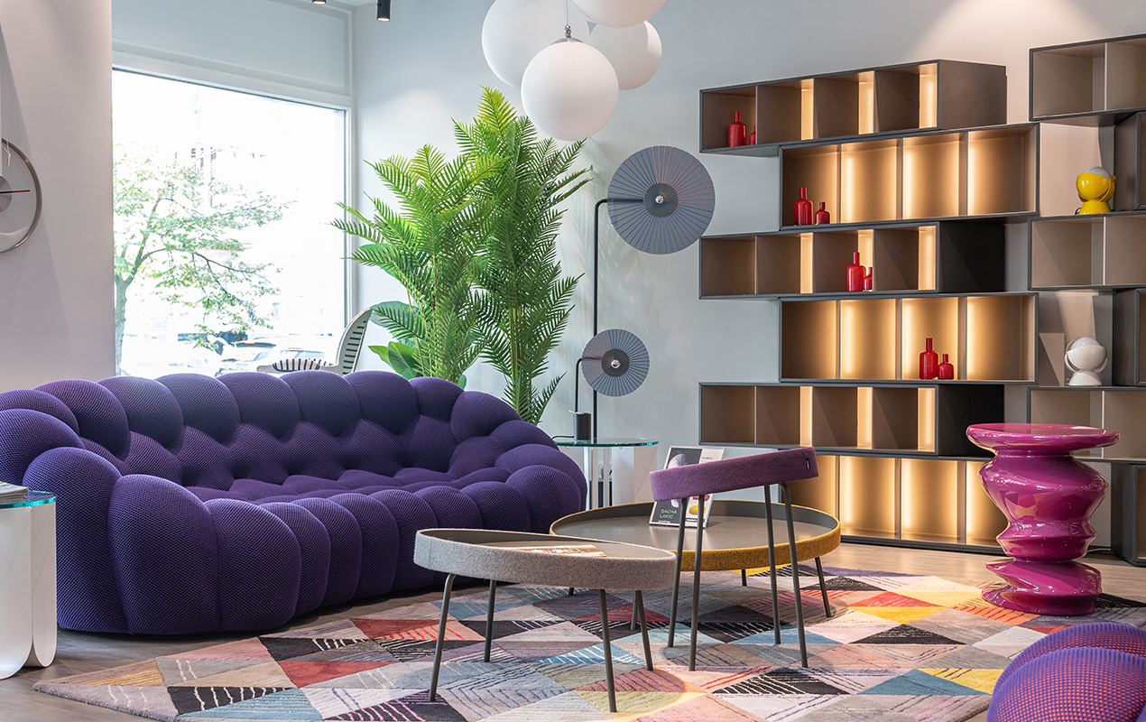 Color inteiror with purple sofa and contemporary coffee table