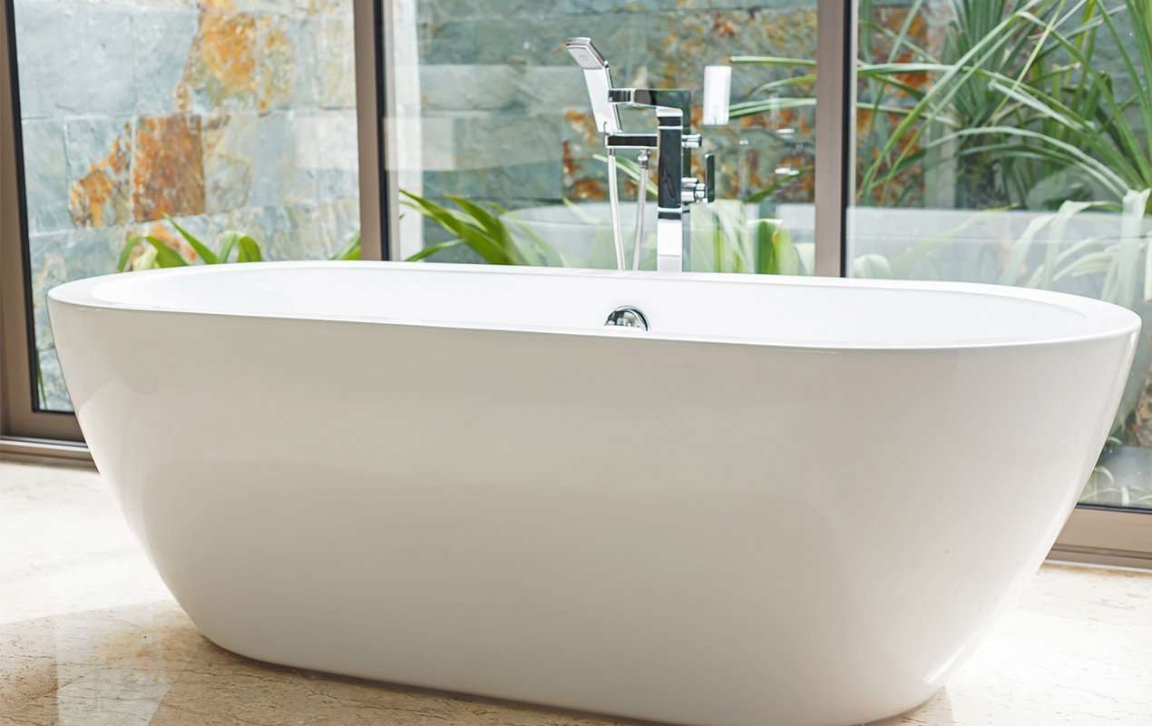 Bathroom interior with fibreglass bathtub