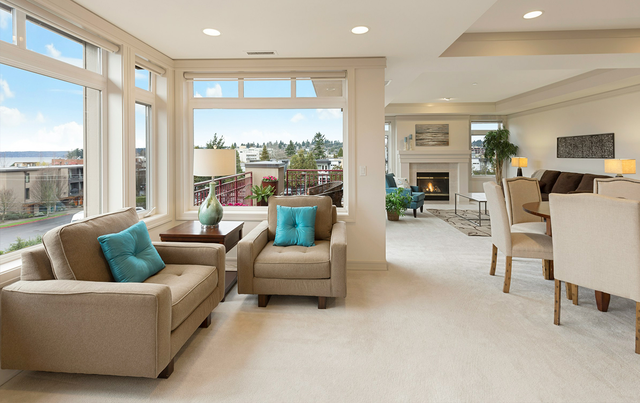 White living room interior with blue accents