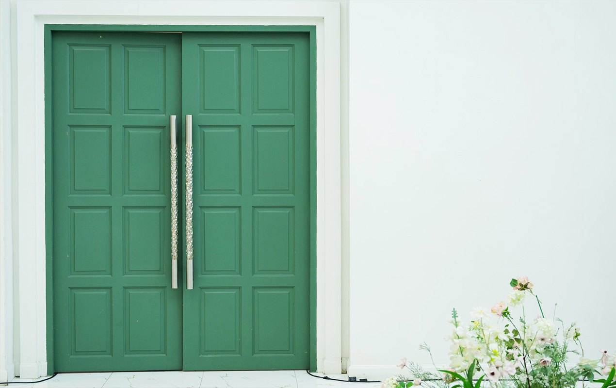 White exterior with sage composite door