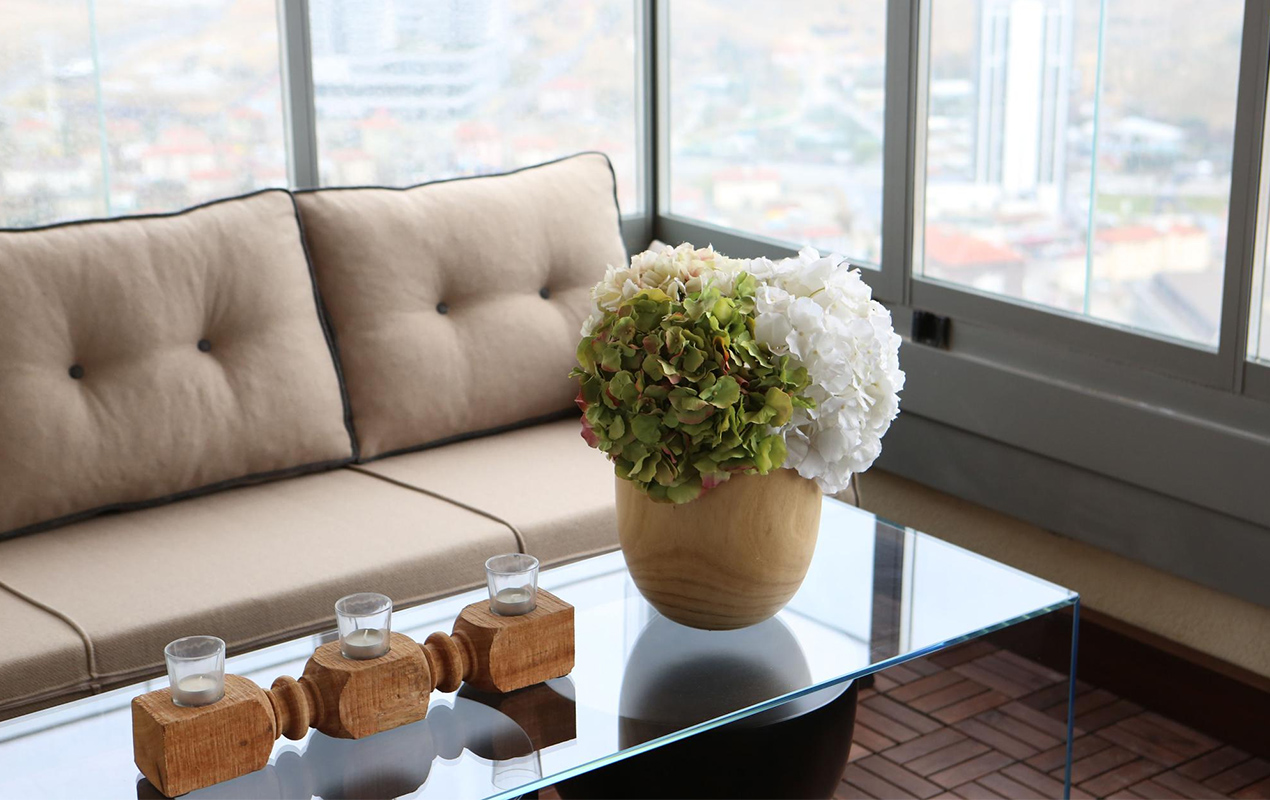 Living room interior with tempered glass coffee table