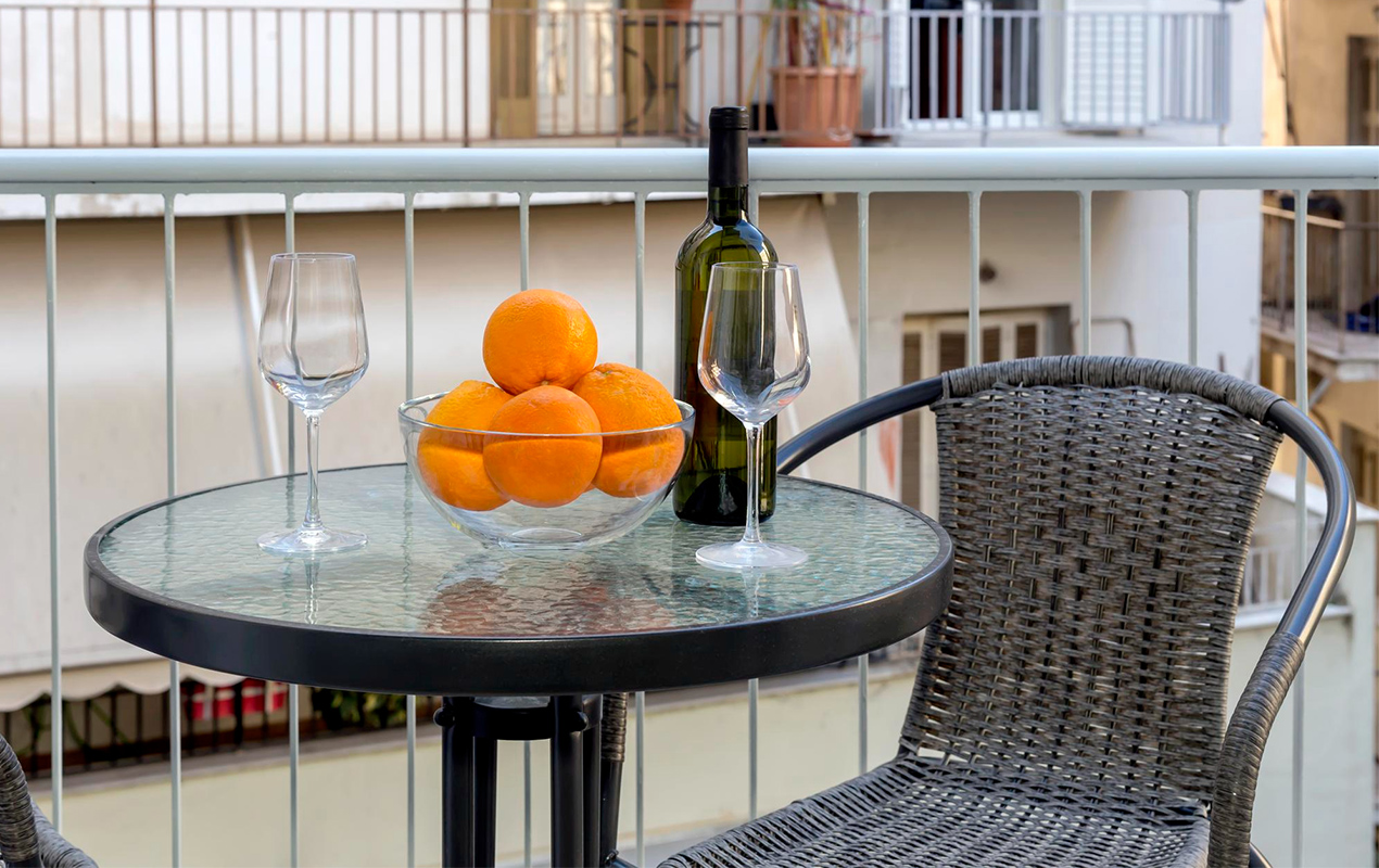 Home balcony with round tempered glass coffee table