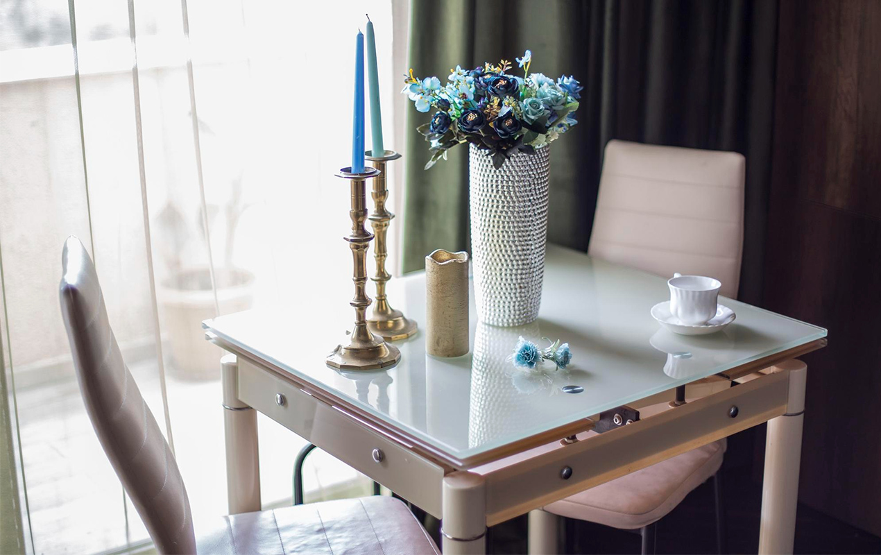 Home interior with square ceramic glass coffee table