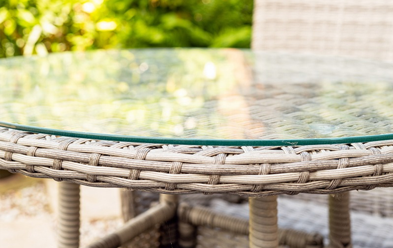 Rattan coffee table with protective glass sheet