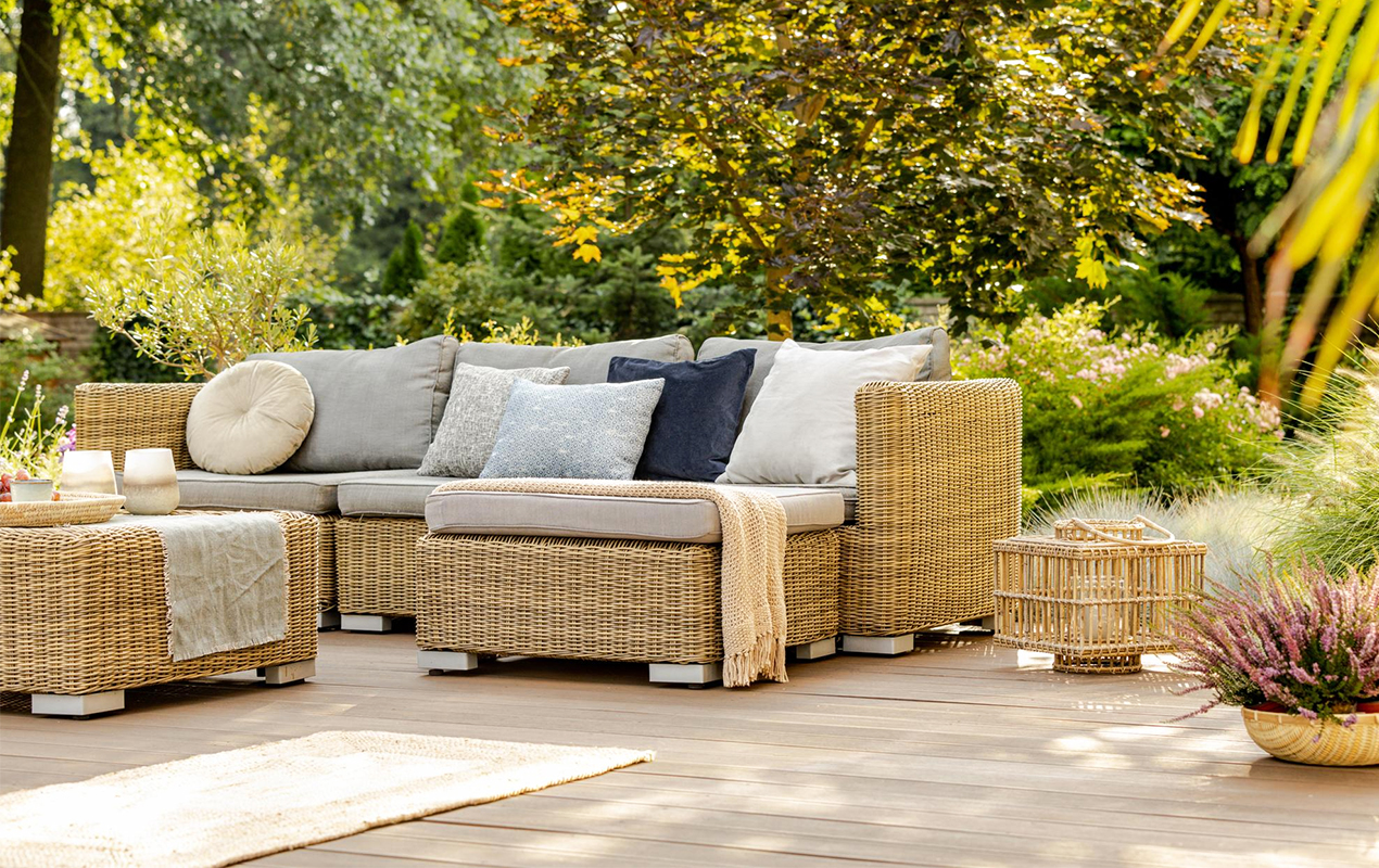 Outdoor space with rattan table and chairs