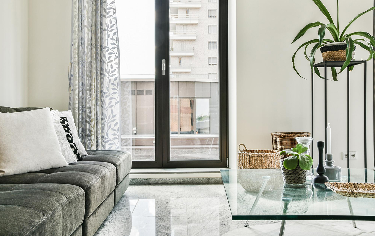 Modern living room with glass coffee table feng shui