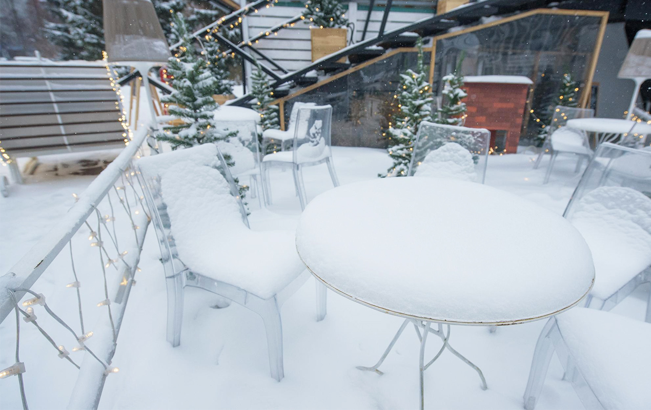 Outdoor patio with glass coffee table