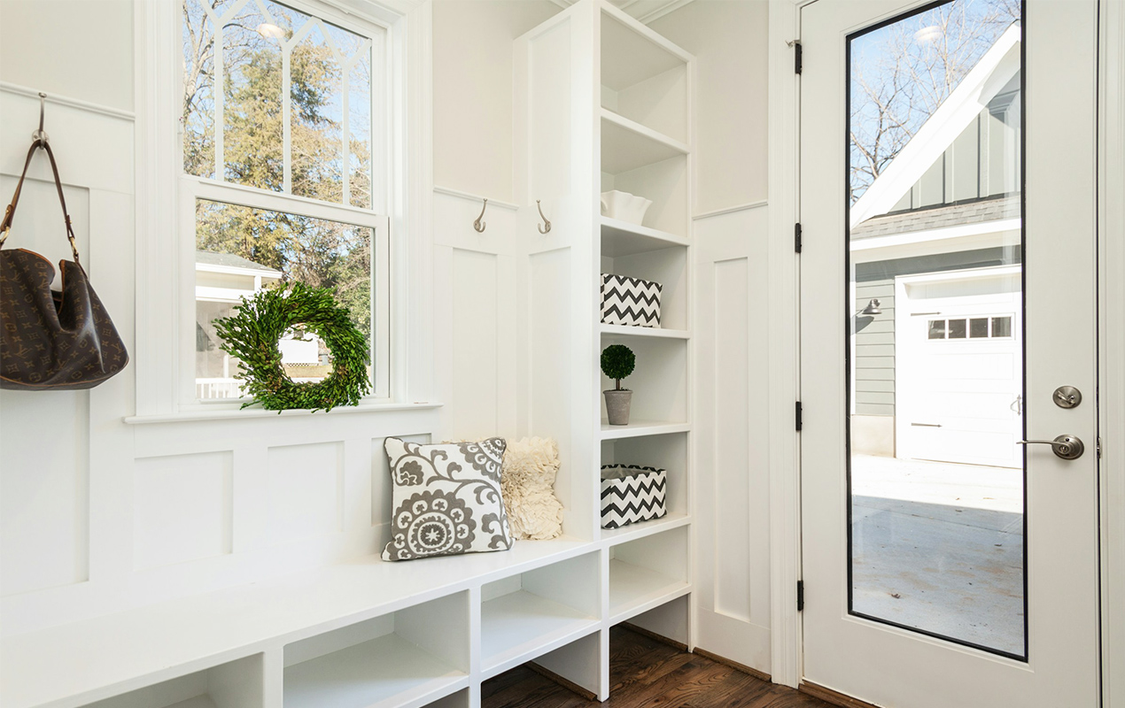 Home entryway with glass door and window