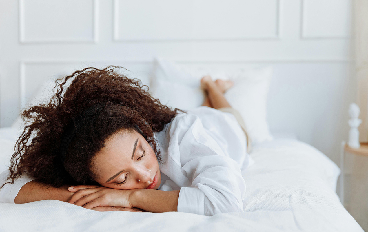 woman lying on bed